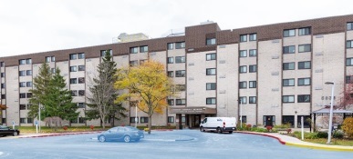 Robert Dorrell Manor Apartments, 6 story complex, tan & brown building