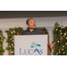 Expressive person giving a speech at the Lucas Metropolitan Housing Authority 85 Years Banquet