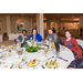 Four guests sitting at a table at the banquet