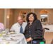 Two guests enjoying their meal at the banquet