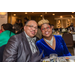 Man and woman smiling at the table