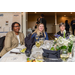 Three women enjoying a meal at the table