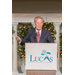 Man giving speech at the Lucas Metropolitan Housing Authority 85 Years Banquet