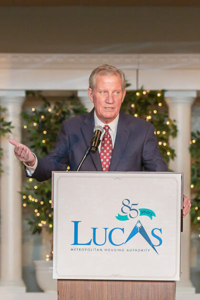 Man giving speech at the Lucas Metropolitan Housing Authority 85 Years Banquet