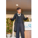 Woman at the edge of the stage giving a presentation