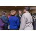 Guests and the hosts of the Lucas Housing Authority having a conversation