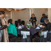 Guests taking a seat at a round table