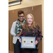 President woman holding certificate with CEO woman 